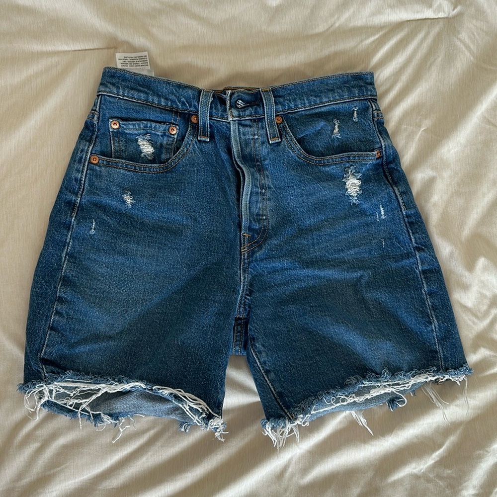 Levi’s denim shorts. Mid thigh length. Size W26
